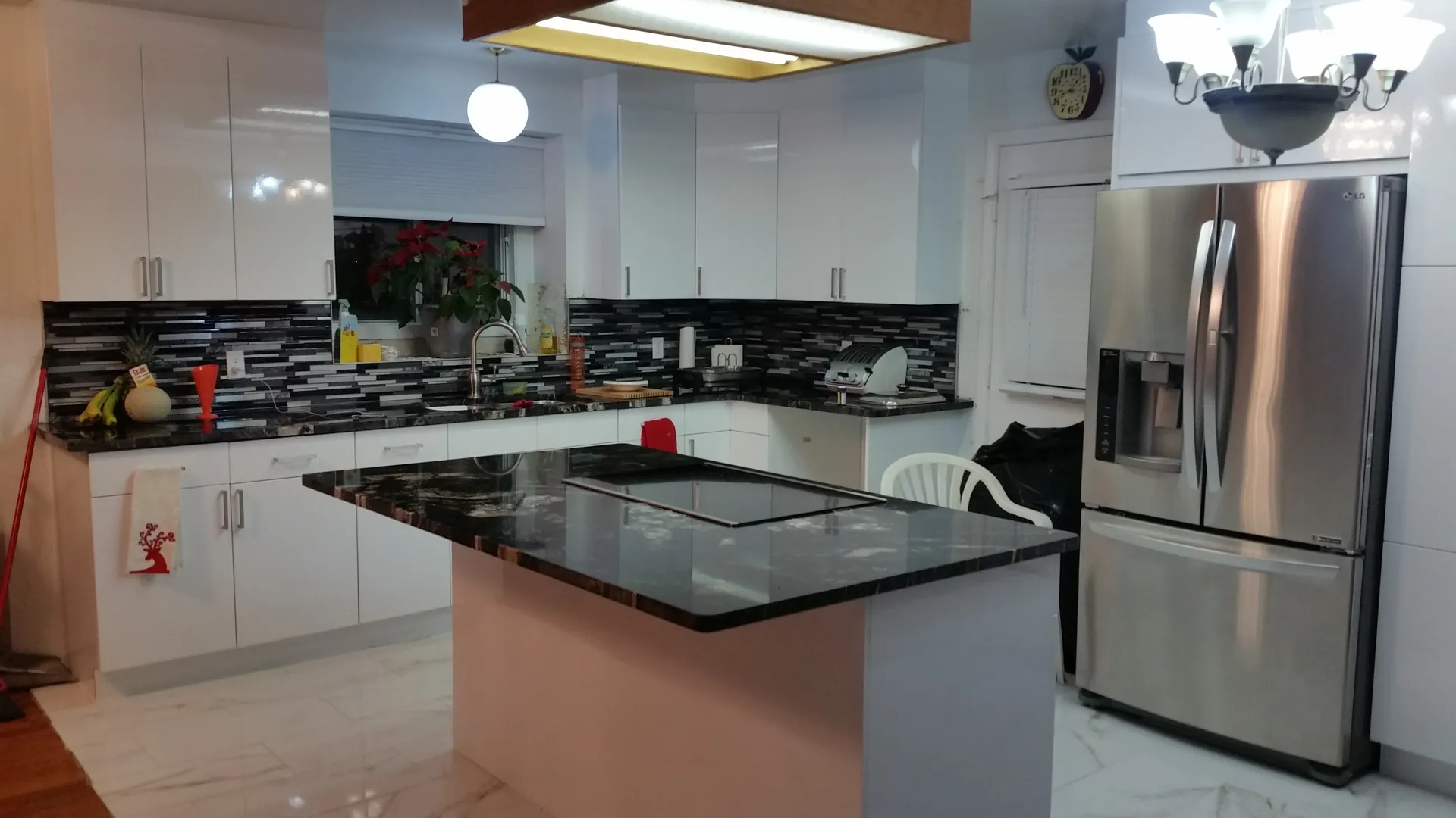 Kitchen with granite island — renovation in Laval