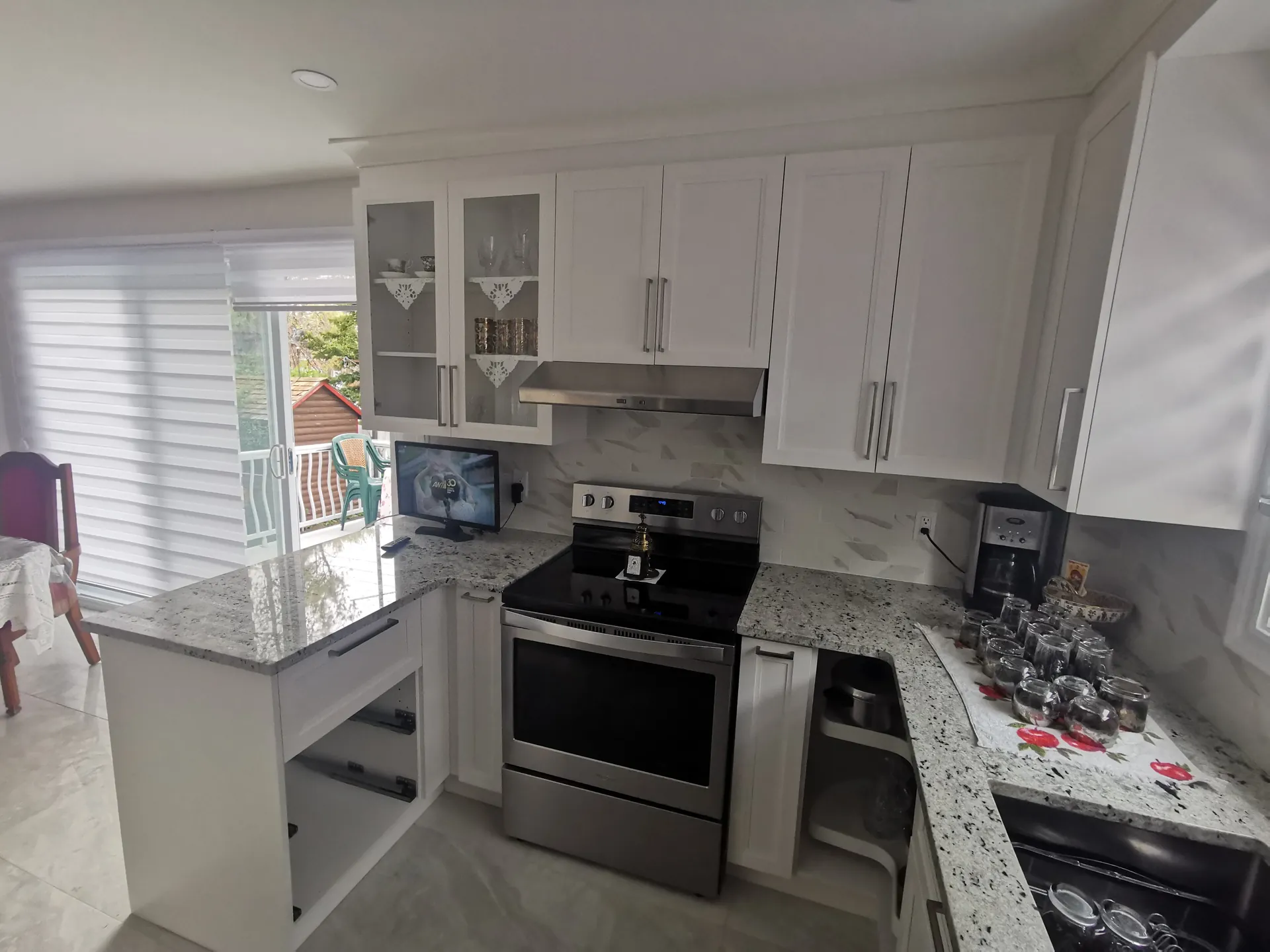 White shaker kitchen renovation in Laval