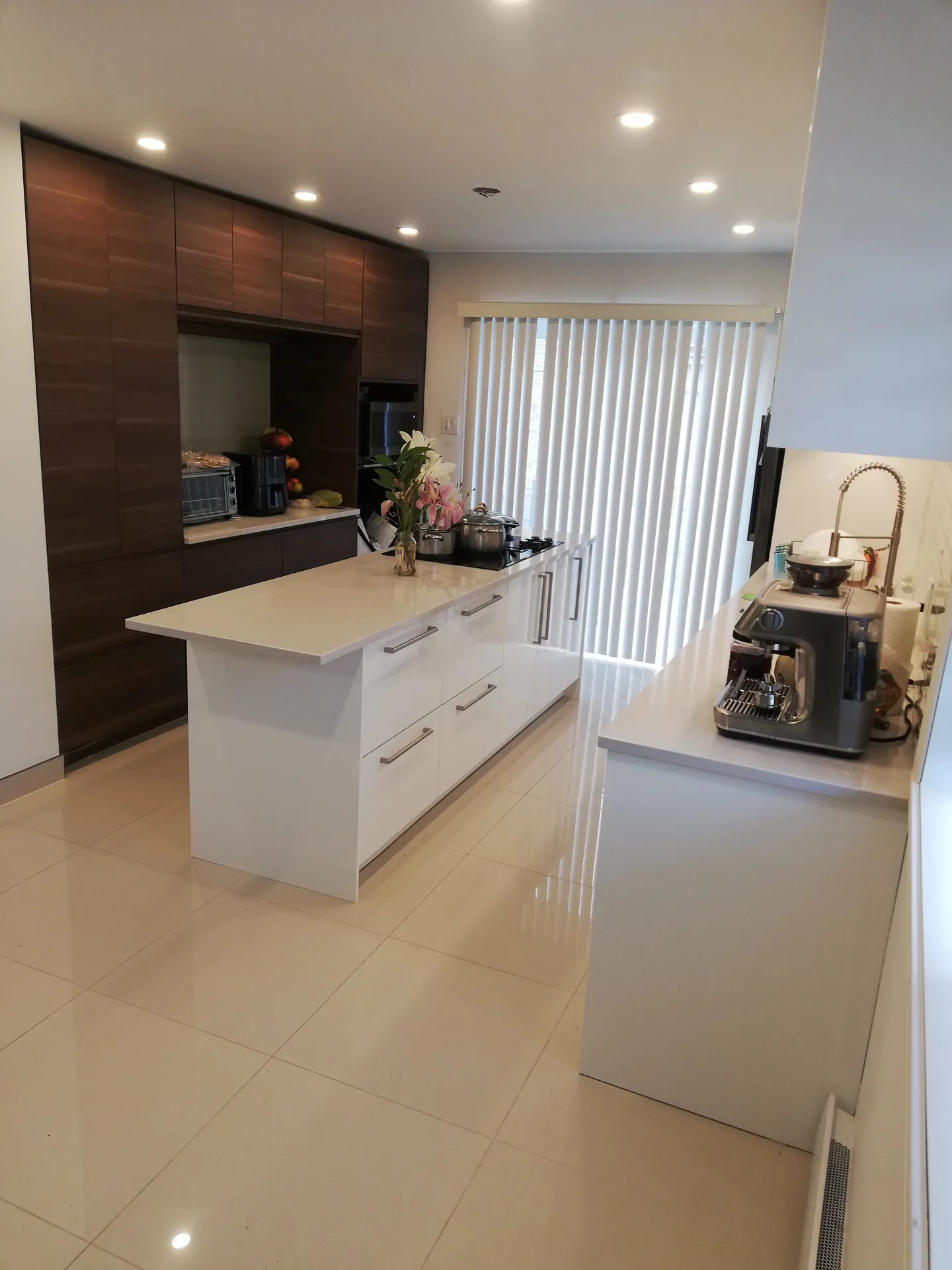 Modern kitchen with island renovation in Laval