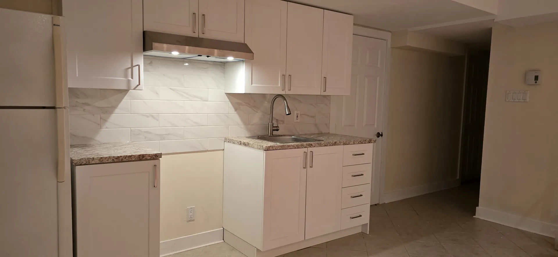 Turnkey kitchen renovation in Laval by Dzign